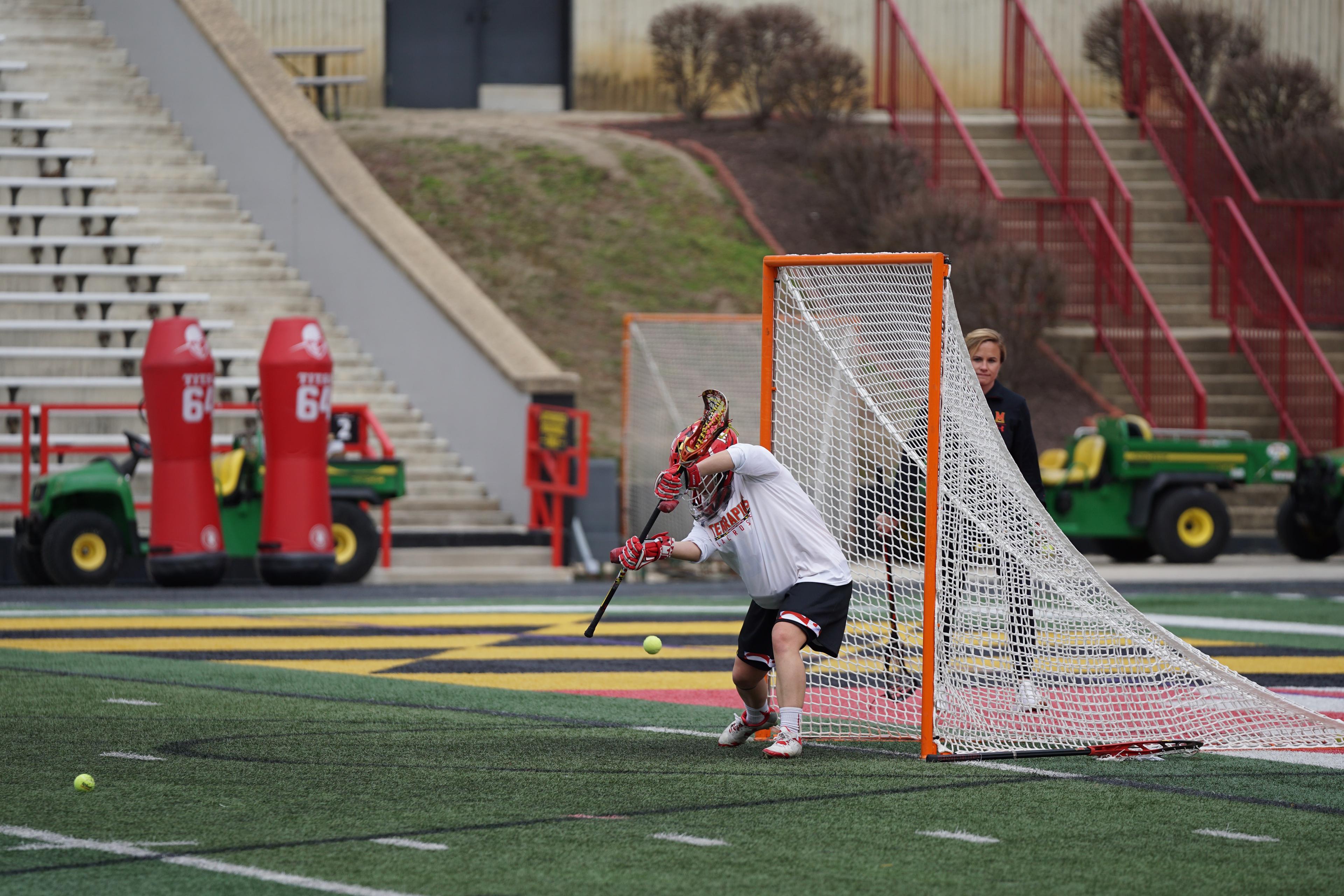 Man playing underhand wall ball