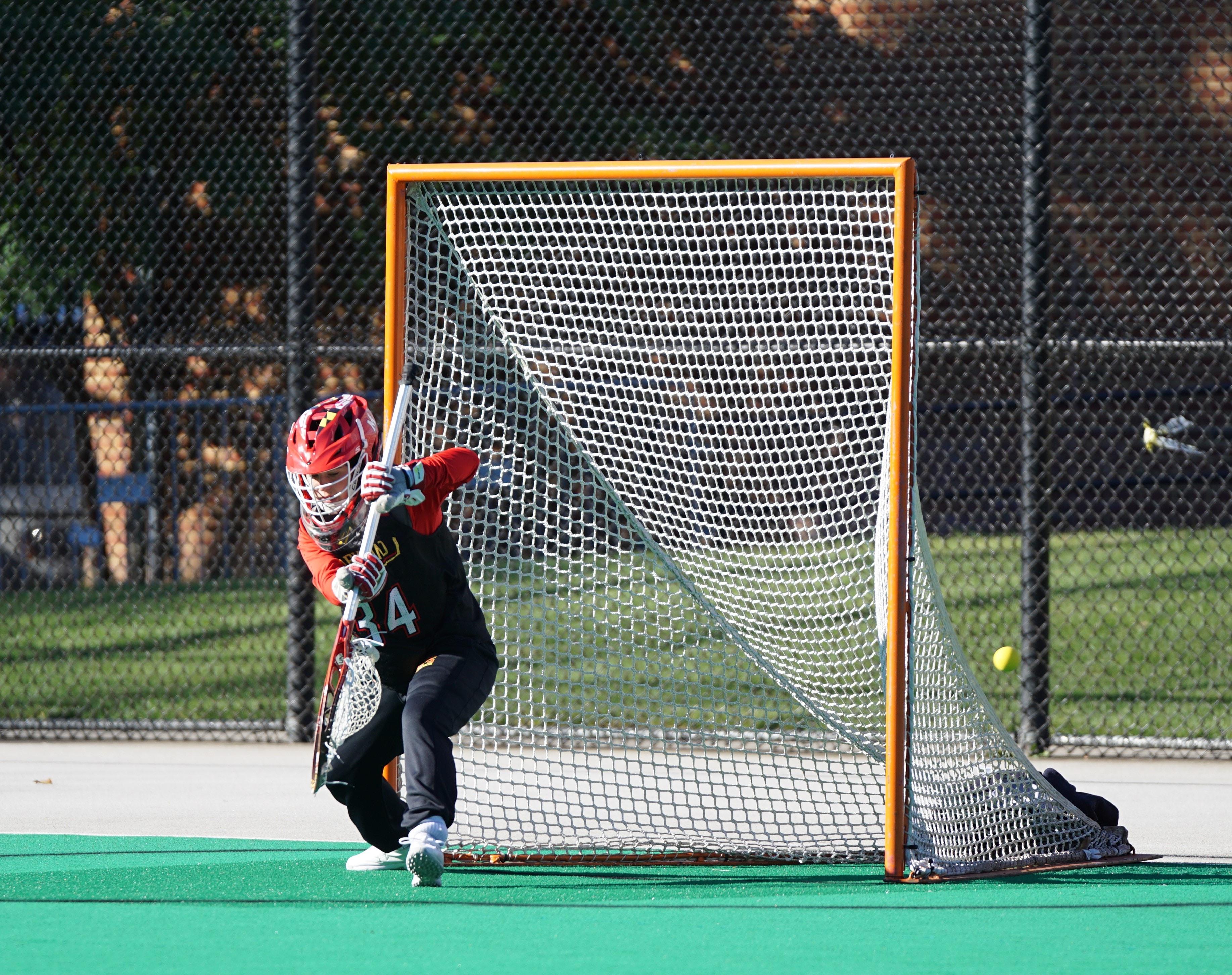 Man playing underhand wall ball